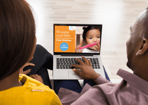 Mother and Father watching a webinar