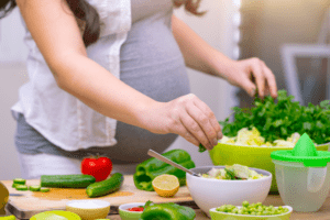 Pregnant Women Cooking a Nutritious Meal