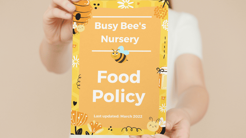 Nursery Working Holding a copy of their nursery Food Policy